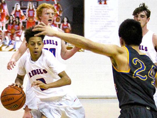 Rebels fall to Trojans in non-district game