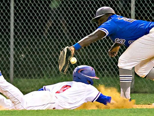 Rebels rally to take down Lobos 9-4