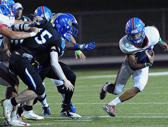 Rebs run past Anderson 35-13 