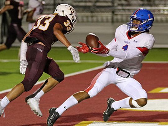 Rebs stun Tigers 22-21