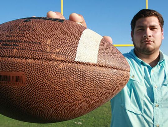 Return to glory: Rebel senior overcomes severe injury to return to the gridiron