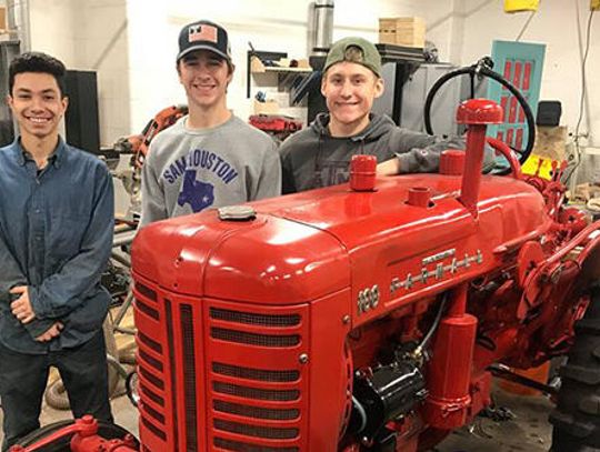 Seeing red; Lehman High CTE students restore tractor