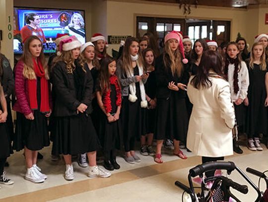 Singing Tigers spread holiday cheer