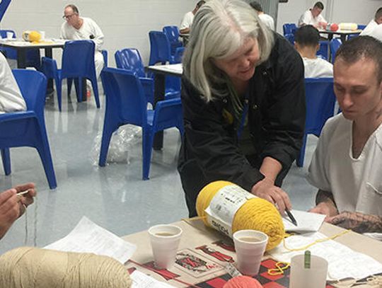 Stitching smiles at Kyle Correctional