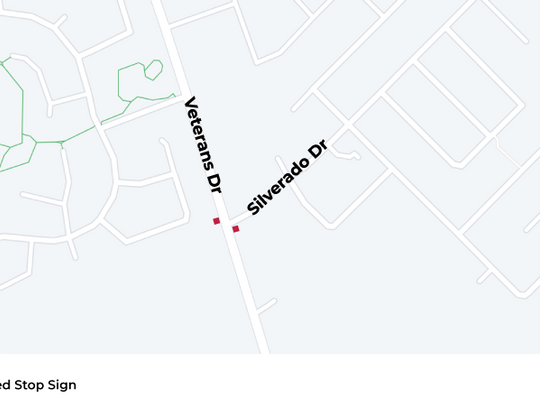 Stop signs removed at Veterans Drive