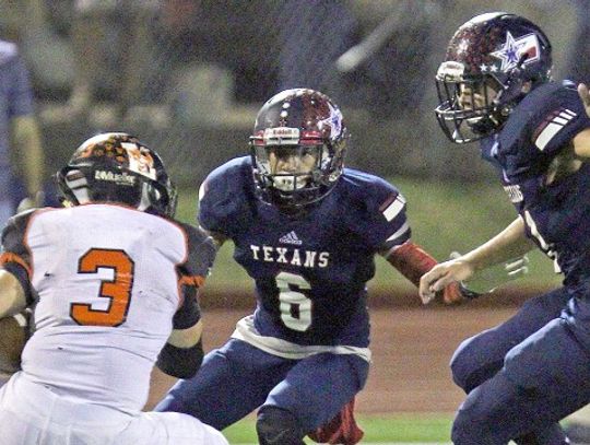 Texans fend off Yellow Jackets 35-16