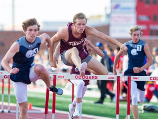 Tiger boys and girls take second place spots at district track meet