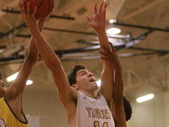Tiger boys crush Crockett 58-33