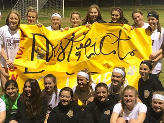 Tiger girls soccer stop Reagan 9-1 to earn district title