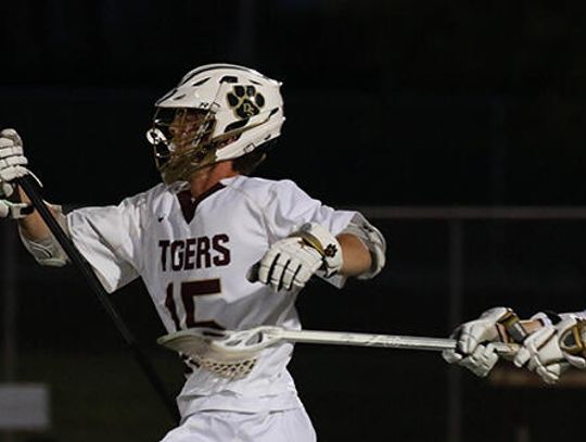 Tiger lacrosse team wins one, loses one
