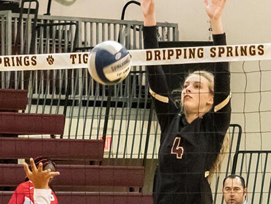 Tiger volleyballers crush Travis in three