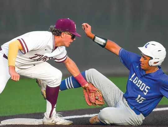 Tigers outlast Lobos in a slugfest
