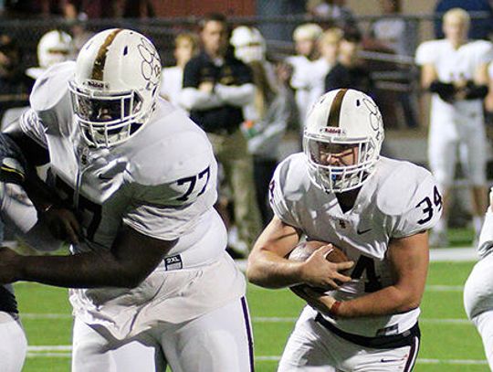Tigers stomp Maroons 63-10 in playoff opener