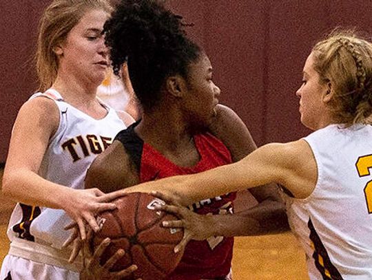 Tigers take down Travis High 62-31
