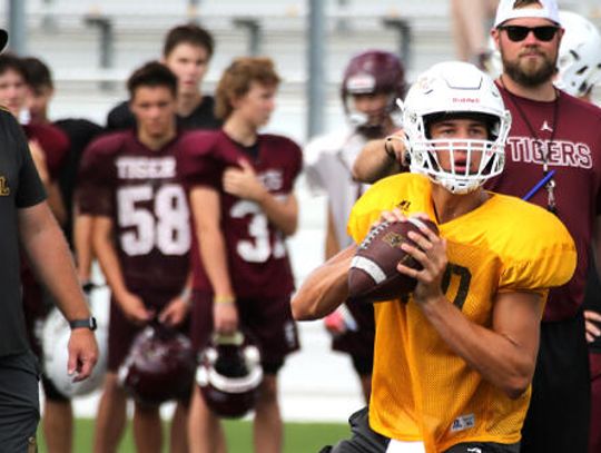 Tigers take stock in return QB
