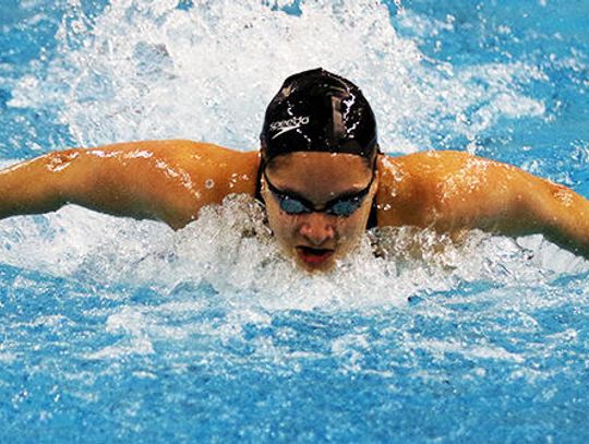 Tigers, Texans hit the pool at state swim meet