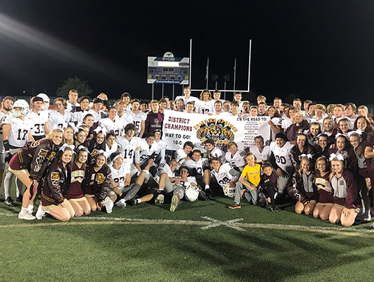 Tigers wrangle Mustangs to secure outright district title