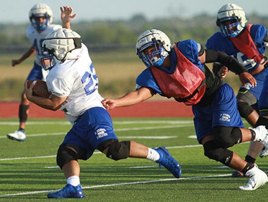 Trojans edge Lobos 34-20