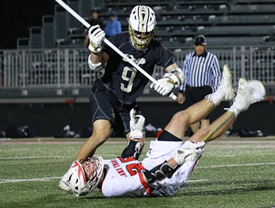 Varsity Tigers lacrosse suffers tough loss against Cavaliers