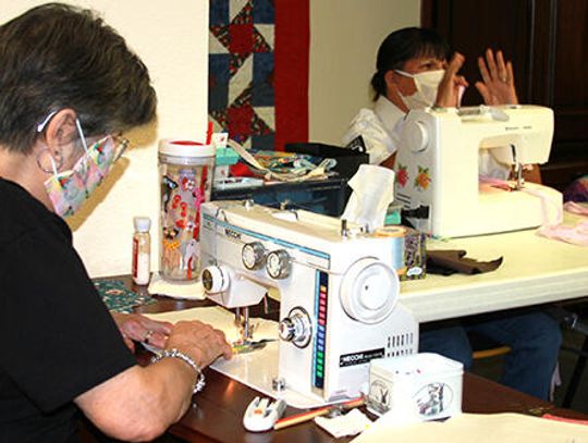 VSO volunteers turning out face masks