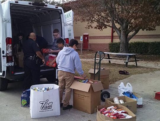 Wallace students provide 87 families with food for a week