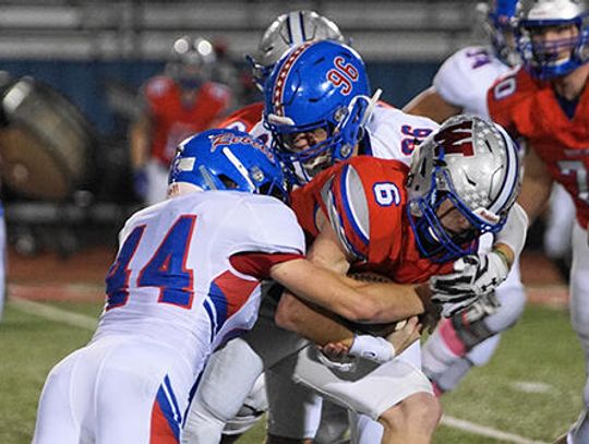 Westlake football pummels Rebels 70-14