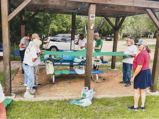 Wimberley locals hang green ribbons, honor flood victims