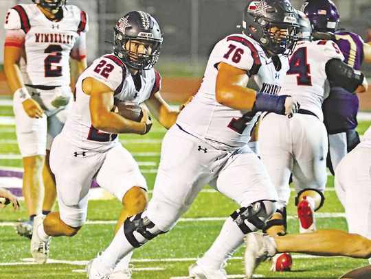 Wimberley rebounds with a win