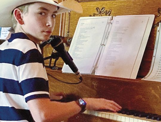 Young piano player rocks Sidecar Tasting Room