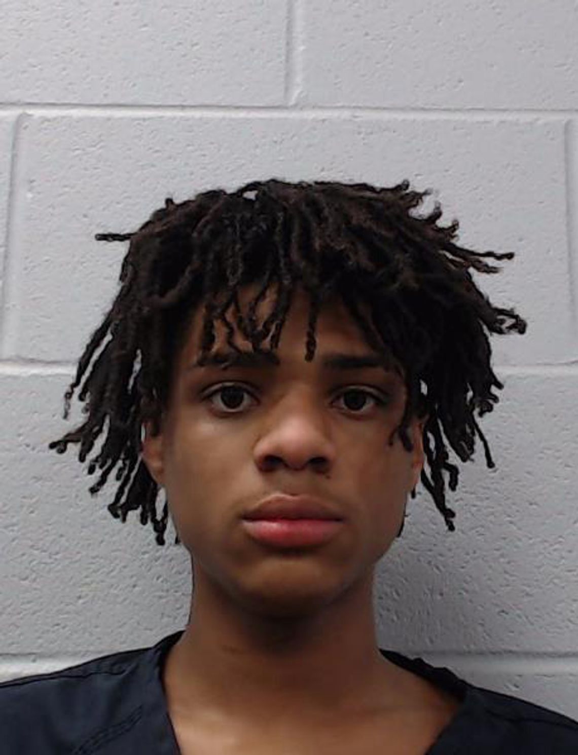 Bond in murder case reduced