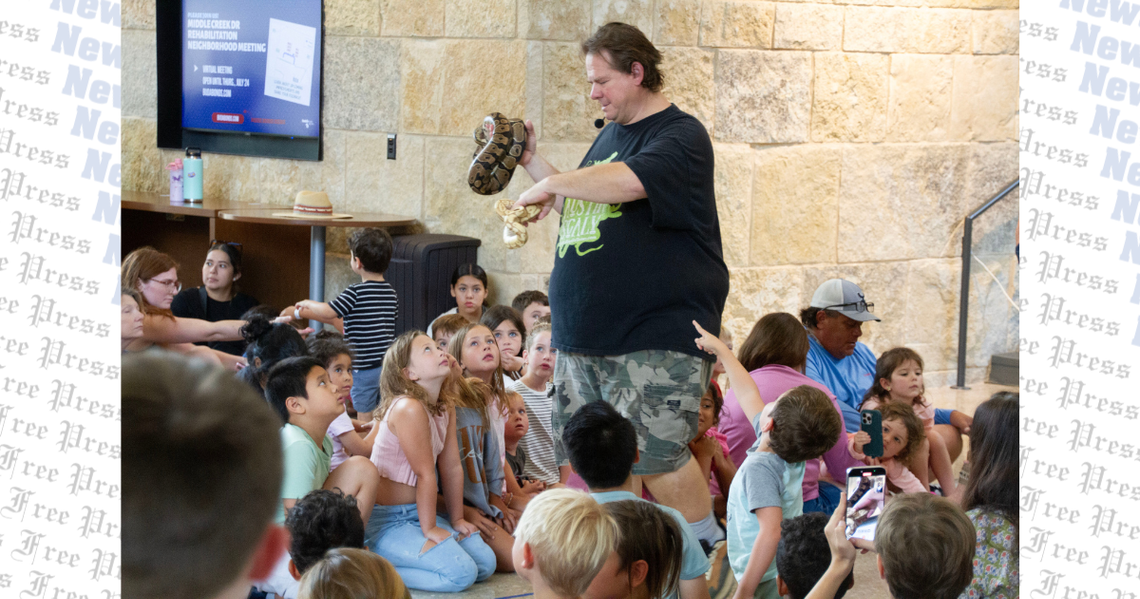 Buda City Hall gets scaly