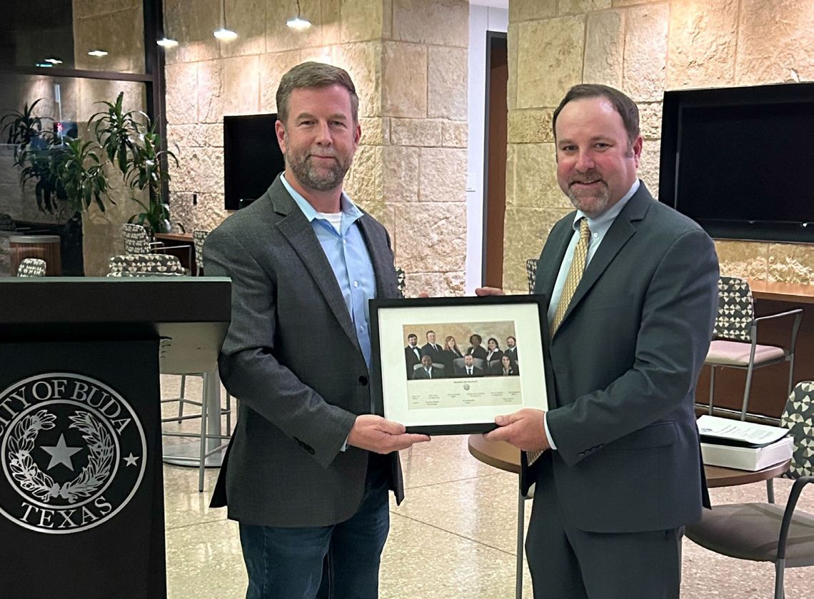Buda honors Daugereau, swears in members