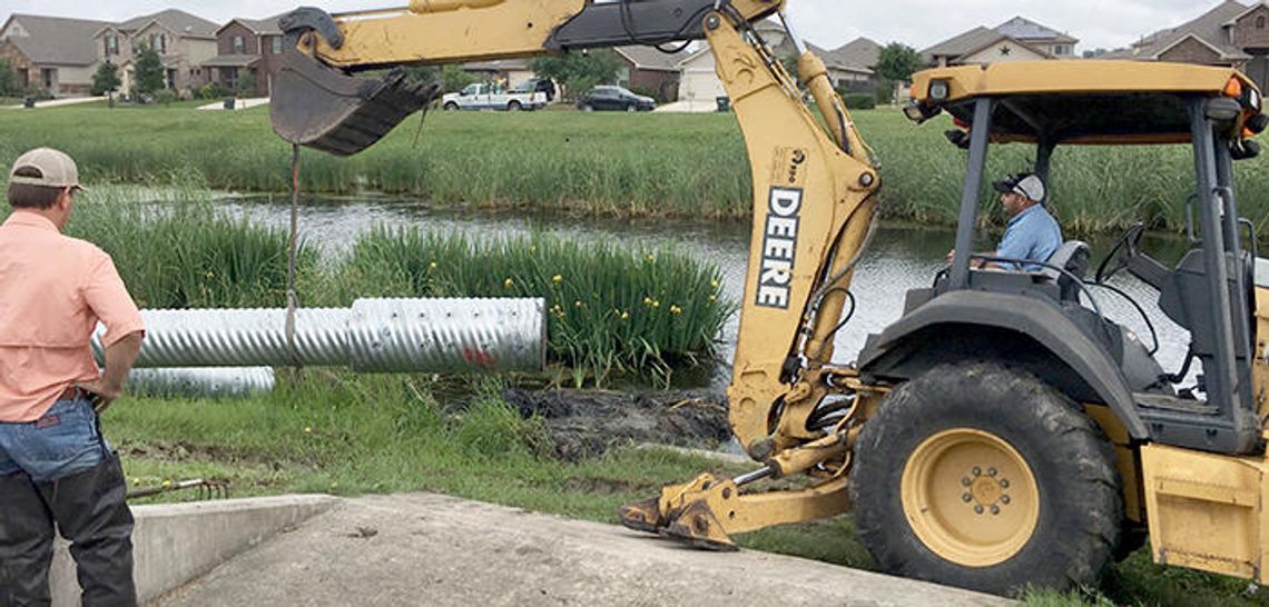 Buda teams up to fix a dam problem