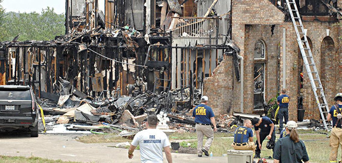 Buda woman dies in house fire