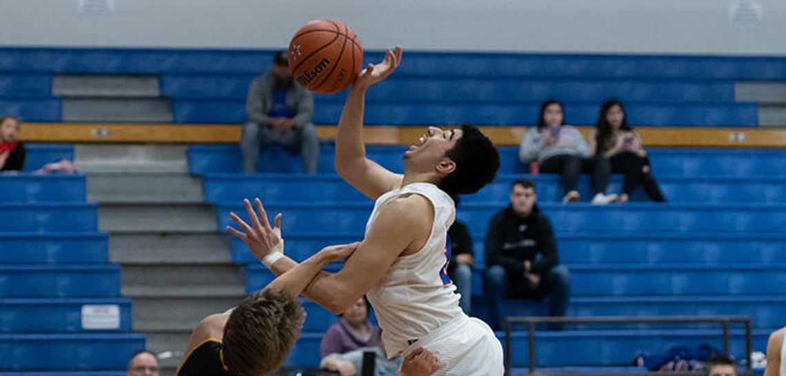 Clutch free throw shooting propels Rebels to victory