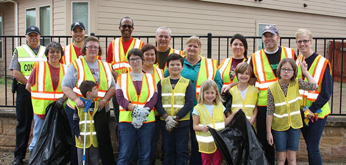 Community members host road cleanup in name of fallen marine