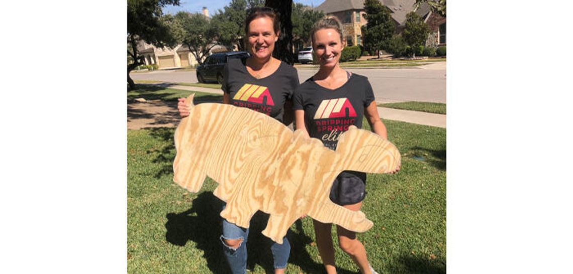 Dripping Spring real estate pros Go Wild for Red Arena