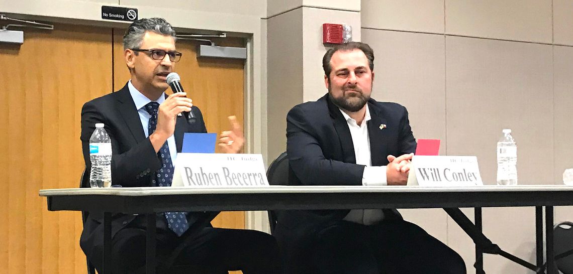 Expertise, debt focus of county judge debate
