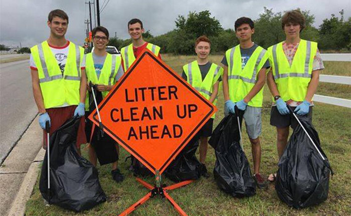 Hays band members clean up adopted highway