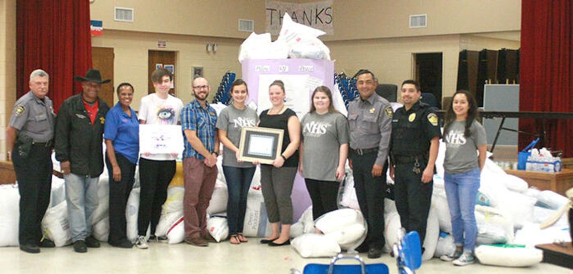 Hays High students collect over 300 pillows for domestic violence victims