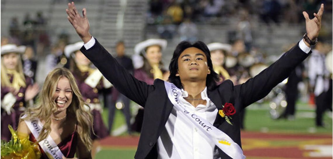 Homecoming royalty accepts accolades
