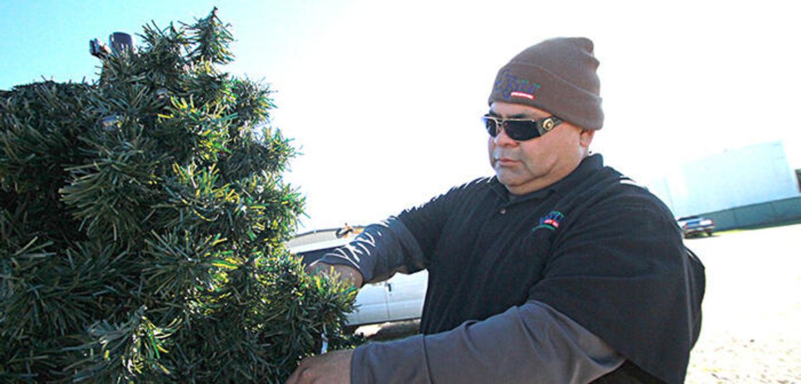 Kyle employee finds his way by giving back to his community