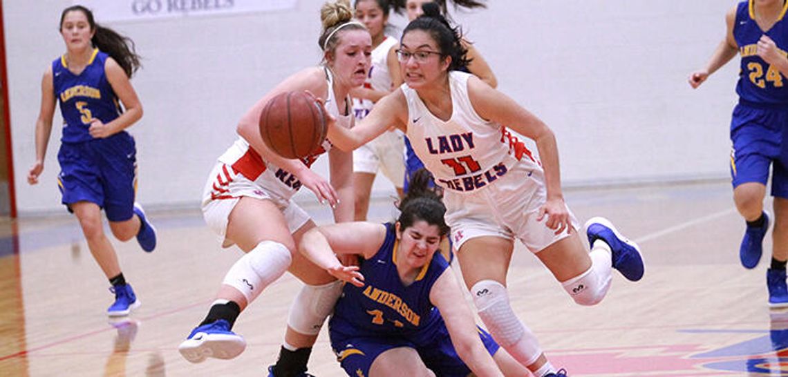 Lady Rebs smack down Trojans 64-37
