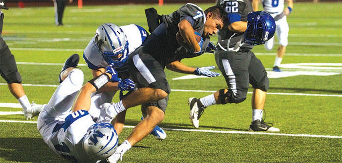 Lobos fall to McCallum 55-17 in home opener
