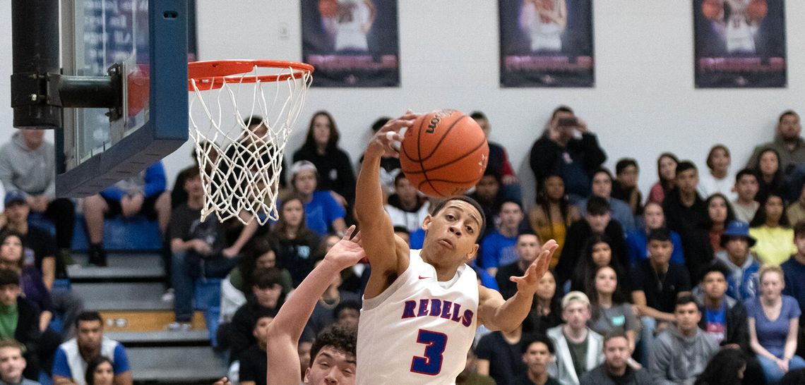 Lobos outlast Hays 51-43
