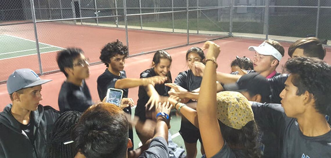 Lobos outlast Rebs in six hour tennis duel