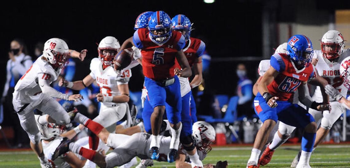 Quarterback Hill powers Hays past Rangers in bi-district playoff