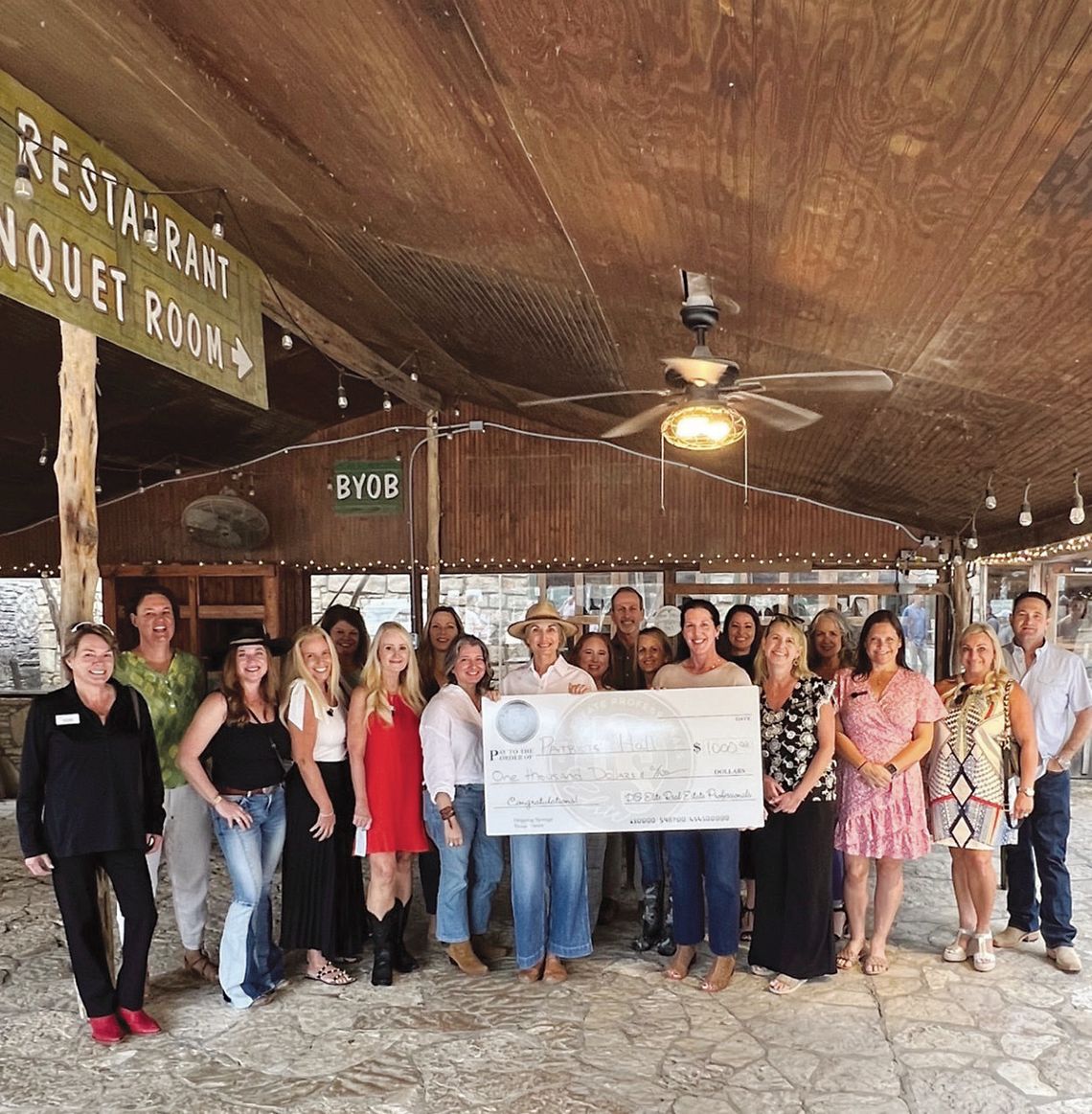 Real estate professionals donate $1,000 to Patriots’ Hall