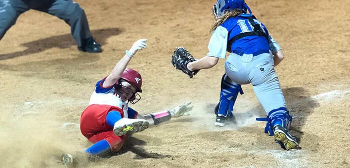 Rebel softball slides past Lobos in 8-7 comeback win