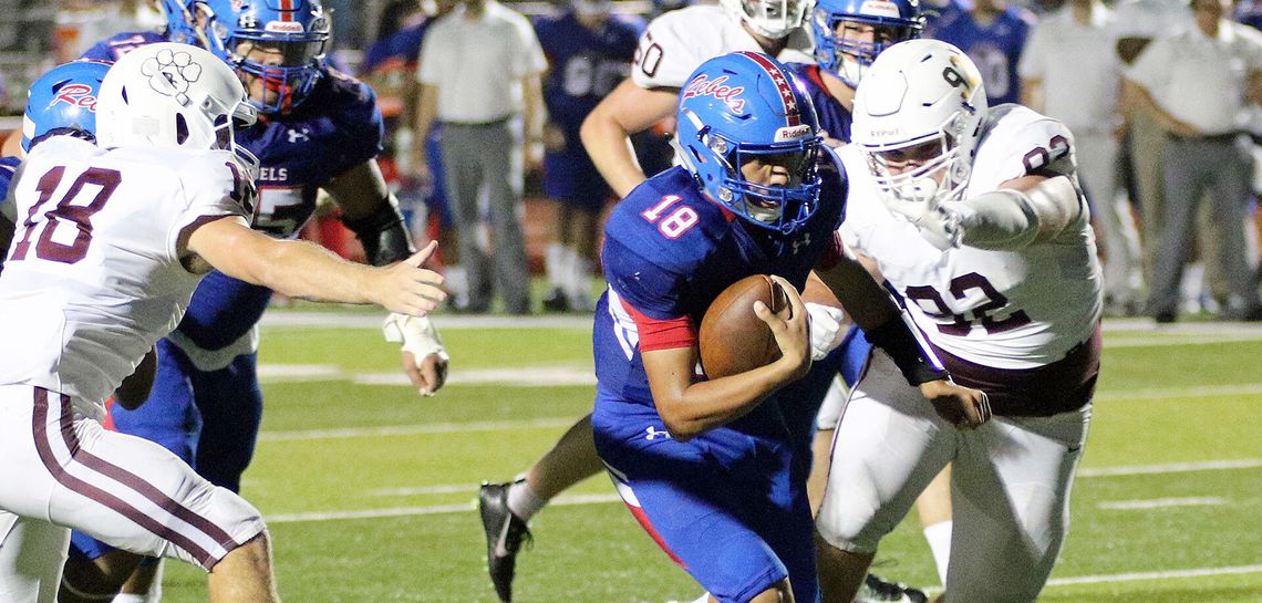 Rebs hold off Tigers in 35-34 thriller